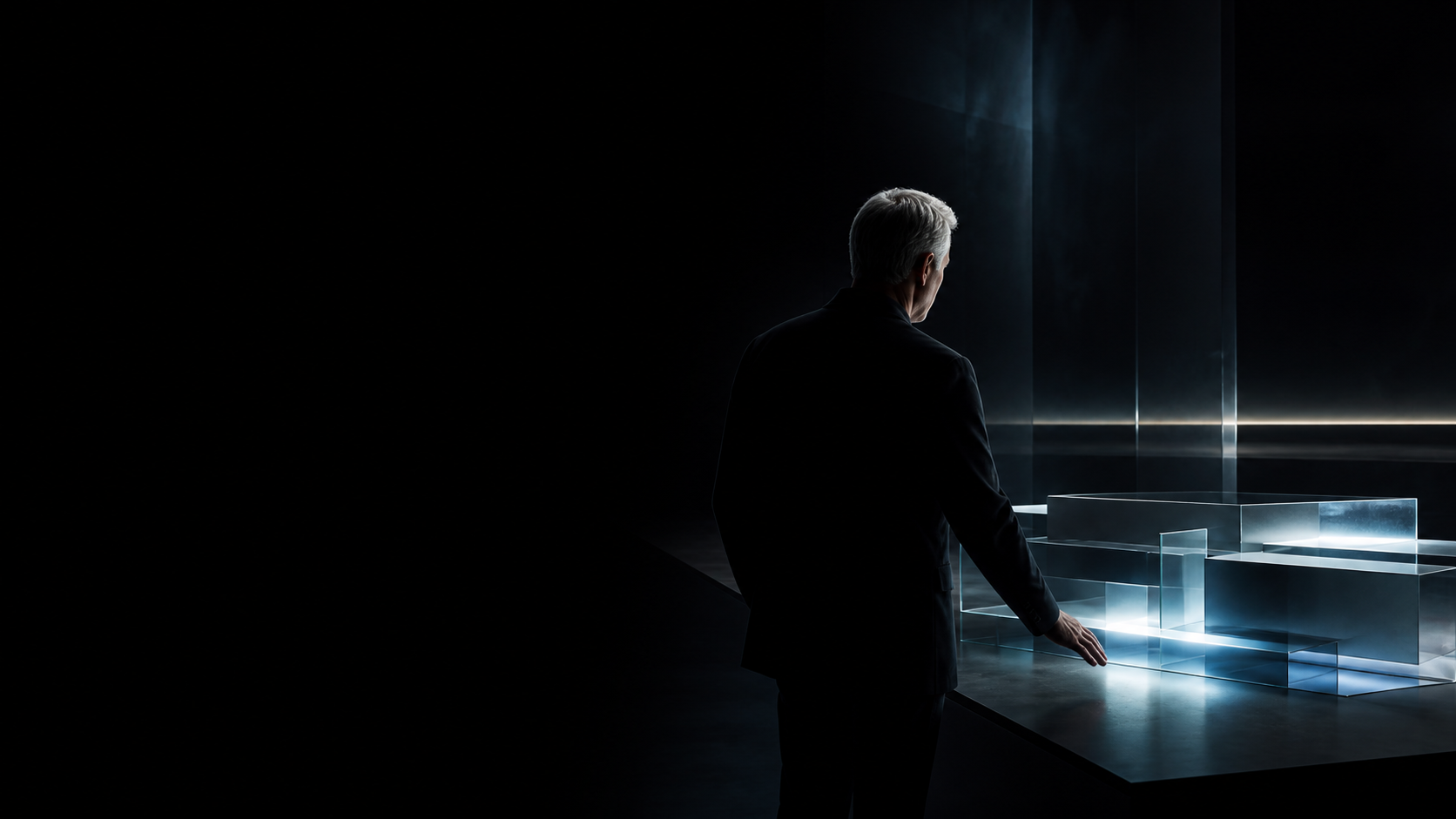 Senior adviser assessing an illuminated physical model.